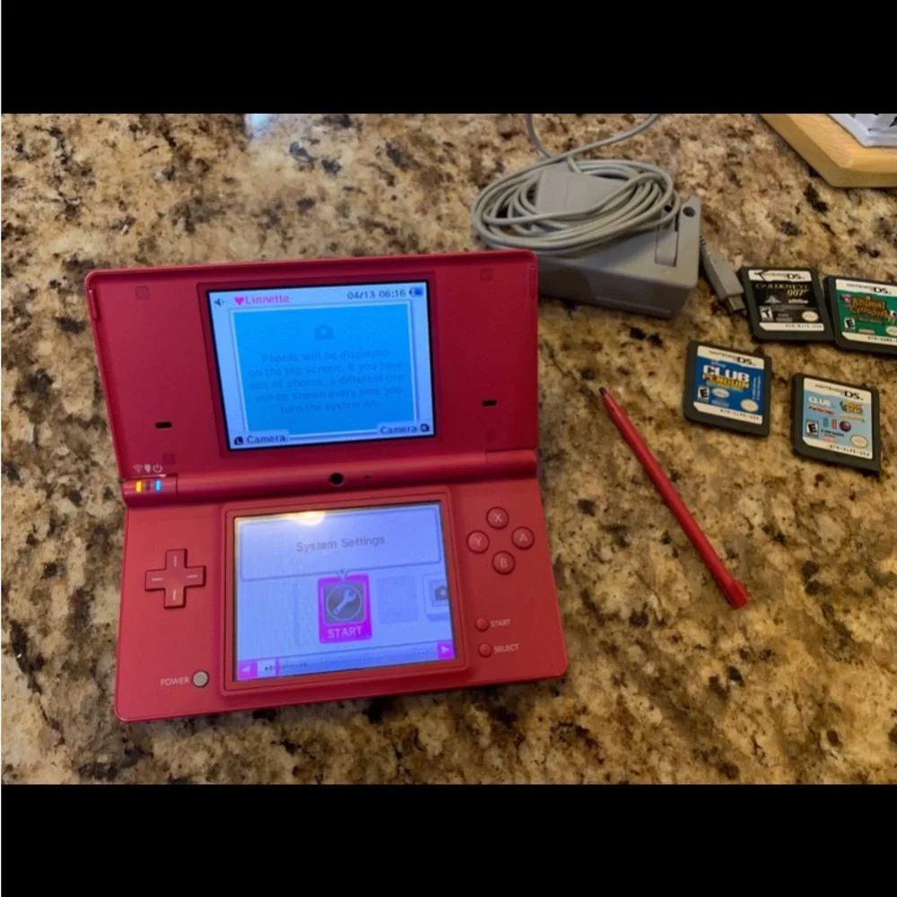 DS Pink Console, Stylus  Pen, Four (4) Games & Charger